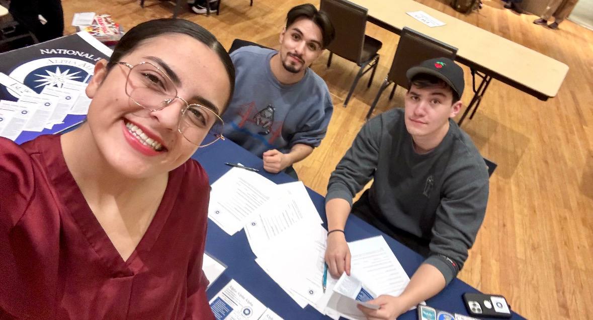 Tri-Alpha members connecting with students on campus